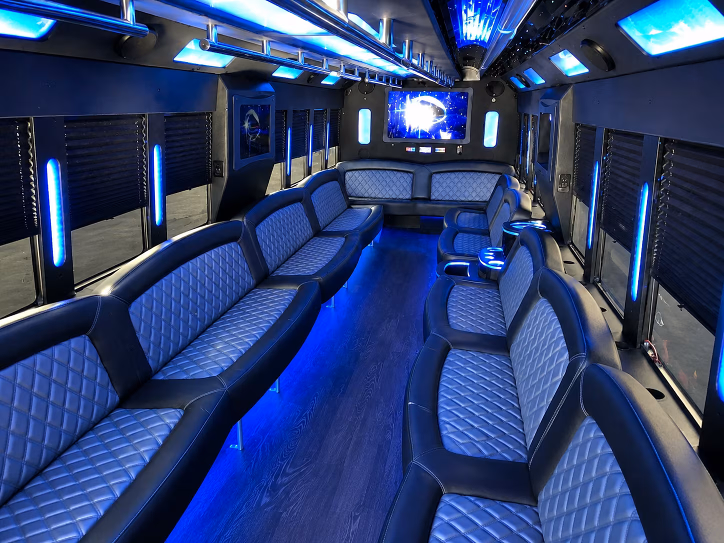 Wedding guests seated inside a party bus serving Boise